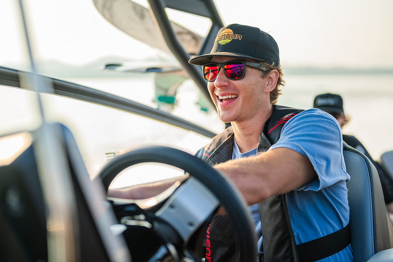 A man operating a boat.