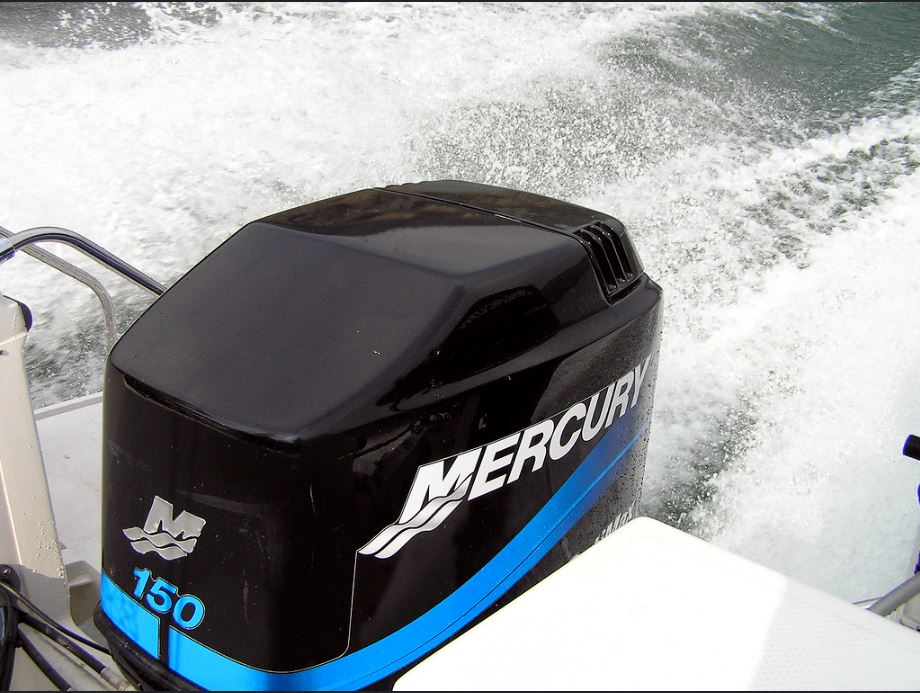 A close up of a Mercury outboard motor.