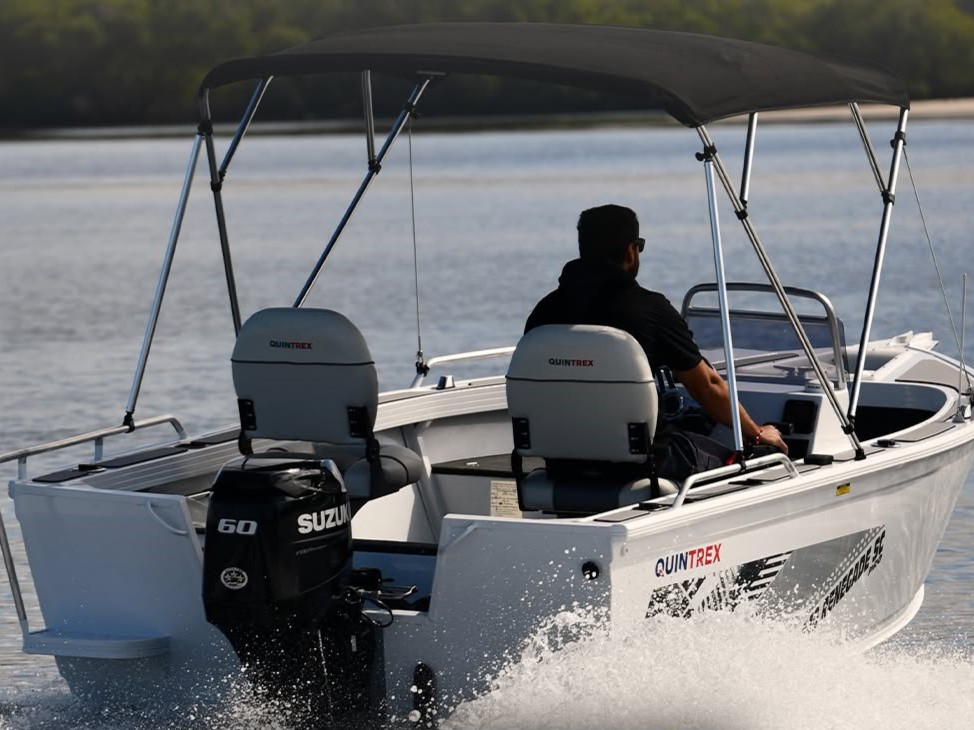 quintrex boat with a suzuki outboard out on the water