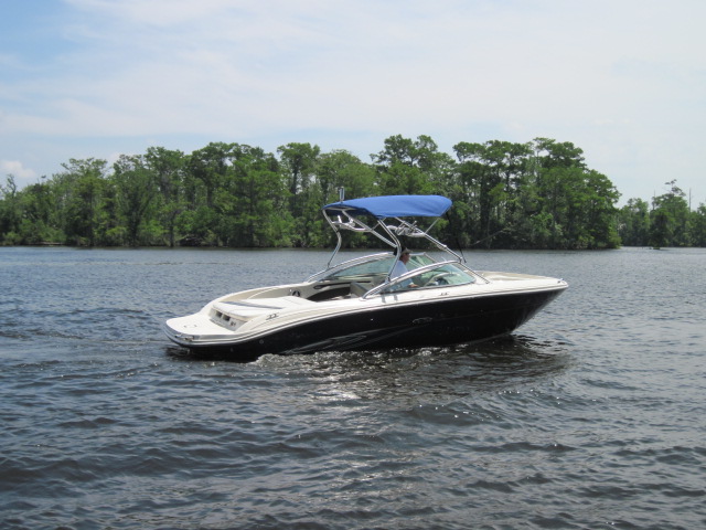 A shot of a boat with a bimini top.