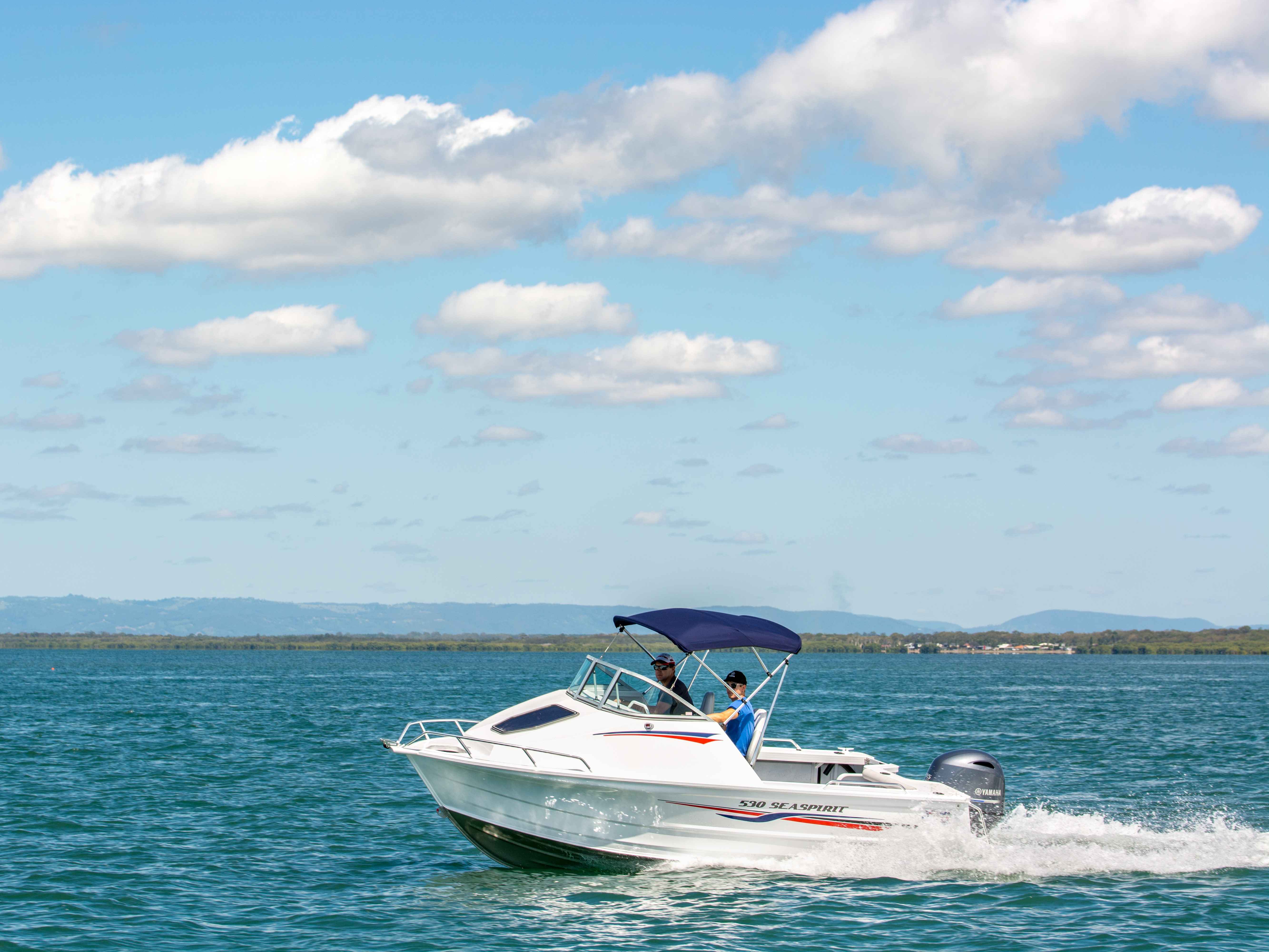 quintrex boat out at sea on a sunny day